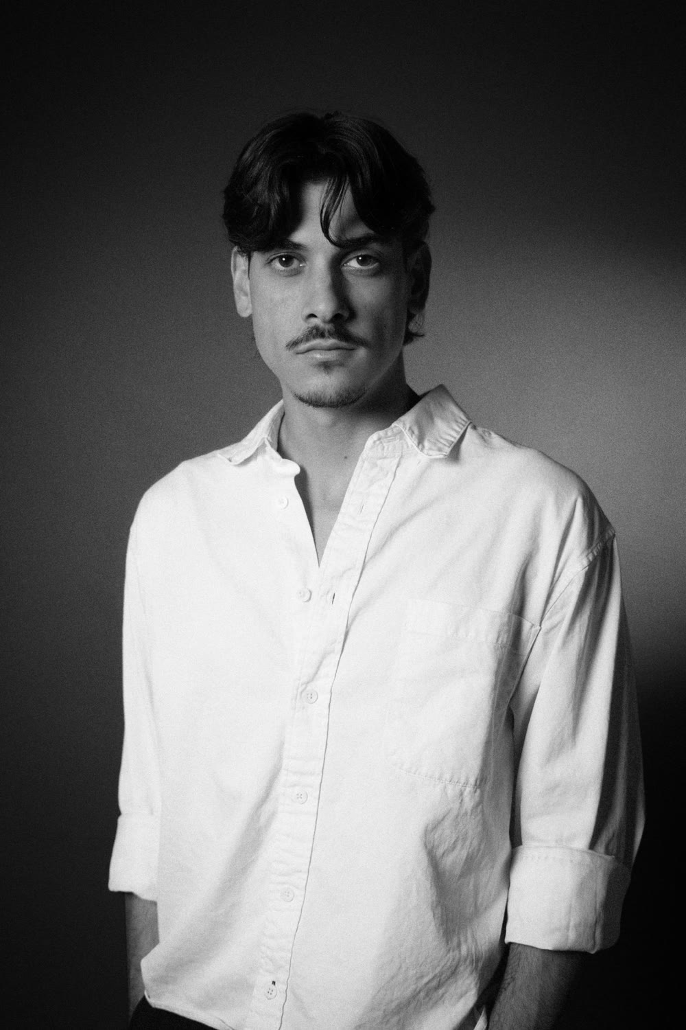Michelangelo Corrado headshot — white shirt