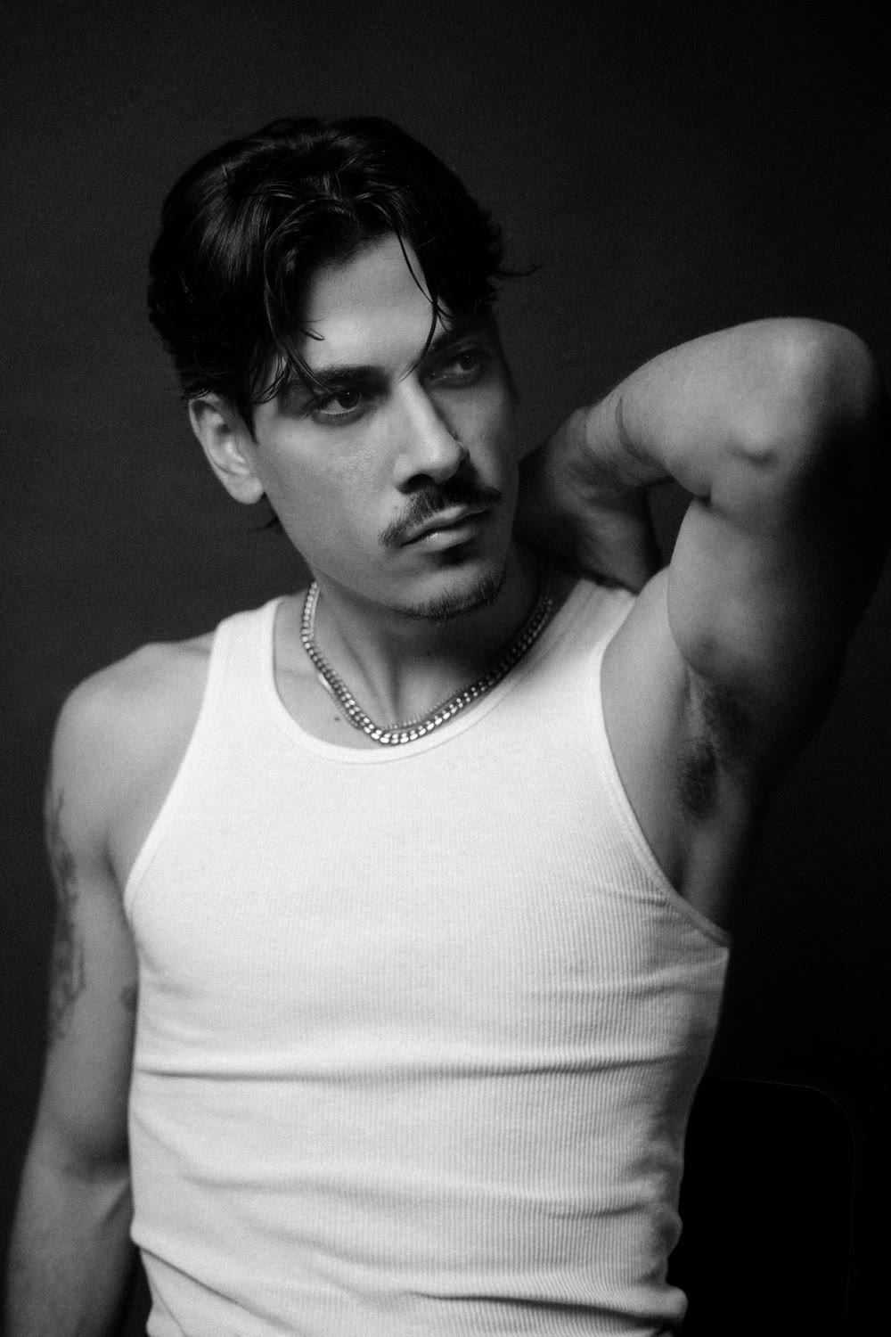 Michelangelo Corrado headshot — white tank