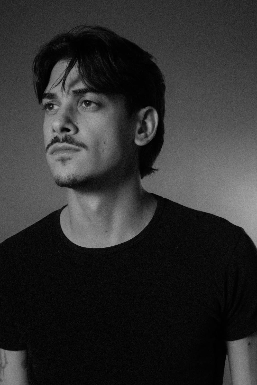 Michelangelo Corrado headshot — black tee